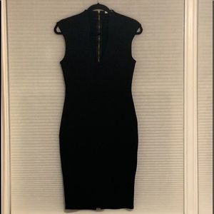 Soprano black shaping dress with deep plunging neckline